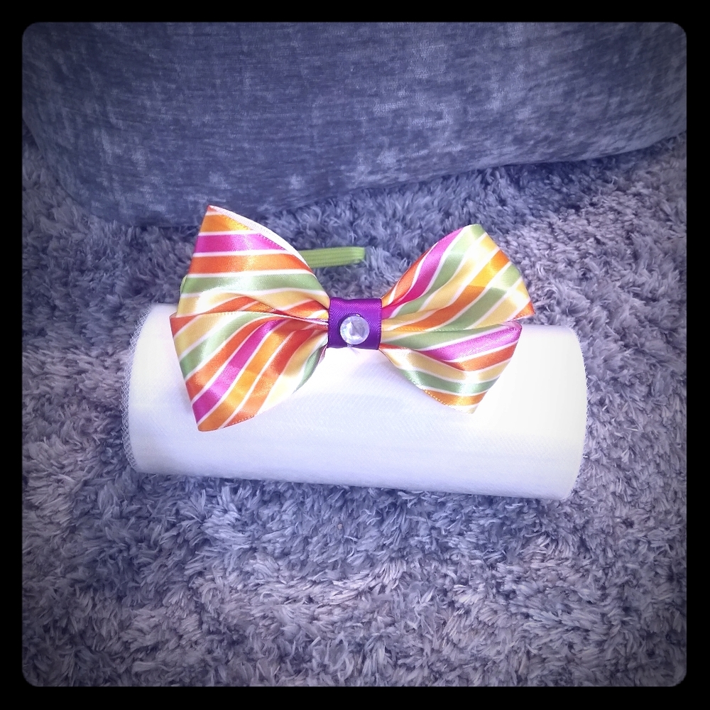 4 handmade bows on headbands